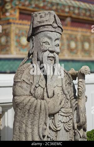 Une statue chinoise dans le domaine de Wat po (Wat Phra Chetuphon), le 'Temple du Bouddha couché', Bangkok, Thaïlande Banque D'Images