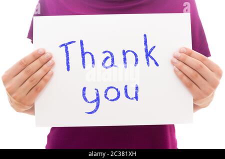 Girl holding feuille de papier blanc avec texte merci Banque D'Images