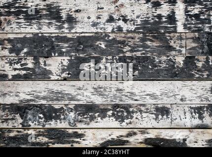 un mur de panneaux fait de panneaux de bois abîmés, texture du bois, texture Banque D'Images