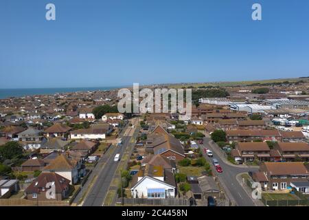 Vue aérienne de Peacehaven dans East Sussex sur la côte sud de l'Angleterre, vers l'ouest en direction de Brighton. Banque D'Images