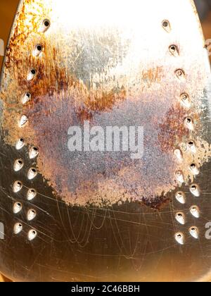 La texture du fond carbonisé d'un vieux fer. Banque D'Images