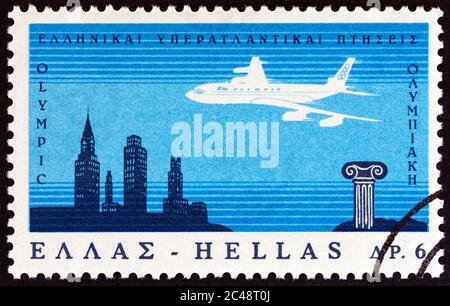 GRÈCE - VERS 1966 : un timbre imprimé en Grèce pour l'inauguration des vols transatlantiques de Greek Airways montre le Boeing 707 qui traverse l'Atlantique Banque D'Images