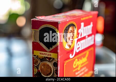 Icône de femme noire utilisée pour promouvoir un aliment de cuisine. Banque D'Images