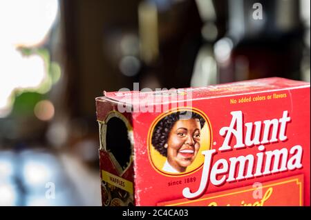 Icône de femme noire utilisée pour promouvoir un aliment de cuisine. Banque D'Images