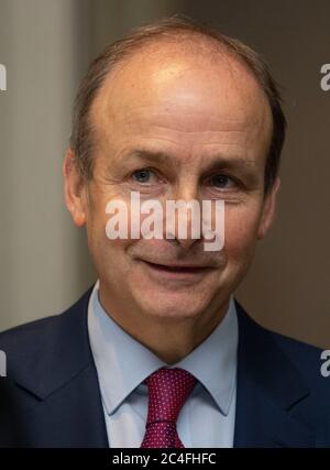 Michée Martin, leader de Fianna Fail, prendra la relève du premier ministre irlandais dans une réconciliation historique d'une querelle politique avec Fine Gael datant de la fondation de l'État il y a un siècle, à l'hôtel Clayton à Dublin, Après quatre mois d'impasse politique a été rompue lorsque les membres de Fianna Fail, Fine Gael et le Parti Vert ont voté pour l'exécution du programme de gouvernement. Banque D'Images