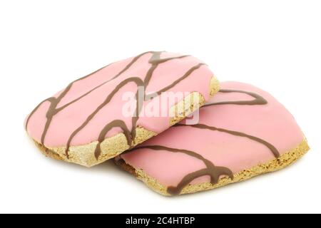 gâteaux fraîchement cuits, roses, avec sauce au chocolat sur fond blanc Banque D'Images