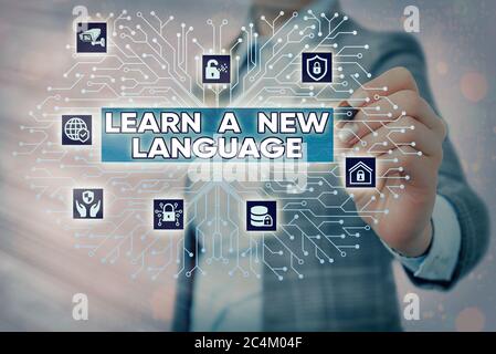 Texte écrit apprendre UNE nouvelle langue. Photo d'entreprise présentant la capacité de communiquer dans la seconde langue ou le contrôle de l'administrateur système Banque D'Images