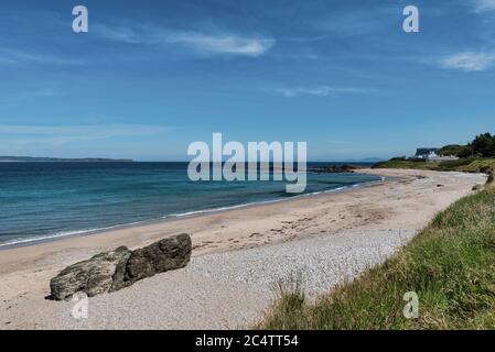 Sable blanc à la plage de Ballycastle dans le comté d'Antrim en Irlande du Nord Banque D'Images