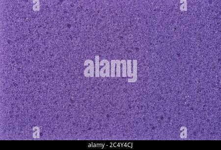 gros plan de l'éponge bleue pour le nettoyage de la vaisselle texture de fond Banque D'Images