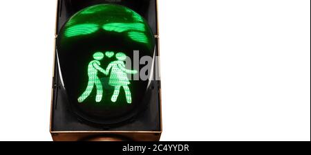 Charmant feu de circulation piétonnier. Couple tenant les mains, valeurs traditionnelles. Lumière verte pour la famille traditionnelle Banque D'Images