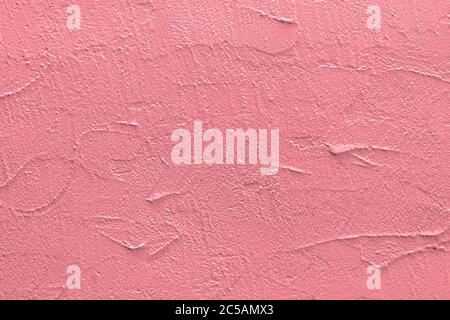 Texture stuc rose. Arrière-plan abstrait architectural. Mur rose du bâtiment. Banque D'Images