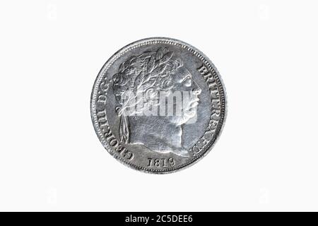 Ancienne pièce de 1819 George III Silver sixpence du Royaume-Uni découpée et isolée sur fond blanc Banque D'Images