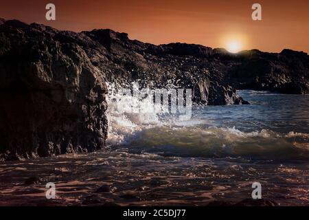 Bracelet Bay destination littoral au coucher du soleil par Mumbles sur le Gower Peninsular West Glamourgan Wales UK Banque D'Images
