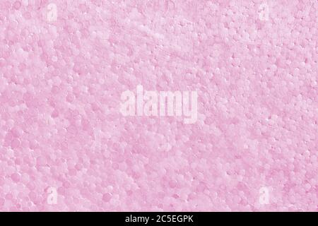 Fond de texture polystyrène ou styromousse. Détail de la feuille de boîte en plastique mousse de styrène. Panneau en mousse de polystyrène rose pour toile de fond. Abstraction en placoplâtre sans couture Banque D'Images