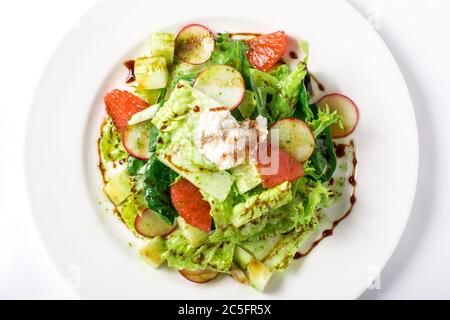 Salade fraîche avec laitue, radis, pamplemousse, fromage et vinaigrette aux agrumes Banque D'Images