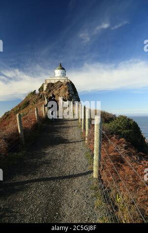 Phare de Nugget point dans le sud de l'Otago, Nouvelle-Zélande Banque D'Images