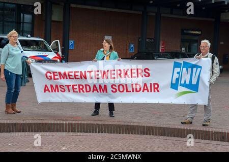 Drapeau à la démonstration pour UN salaire de 14 euros à Amsterdam, pays-Bas 1-7-2020 Banque D'Images