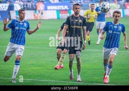 Lubomir Satka de Lech Poznan, Tomas Pekhart de Legia Warszawa et Bohdan Butko de Lech Poznan sont vus en action lors du match PKO polonais Ekstraklasa entre Lech Poznan et Legia Warszawa au stade municipal de Poznan.(score final; Lech Poznan 2:1 Legia Warszawa) Banque D'Images