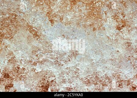 Fond de vague de mer avec bulles et mousse gros plan, doux foyer Banque D'Images