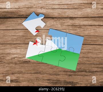 Drapeau national de Djibouti sur puzzle. Il manque une pièce. Concept de danger. Banque D'Images