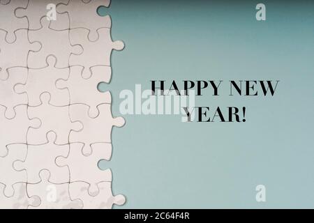 Bonne année avec pièces de puzzle Banque D'Images