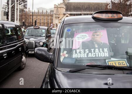 Des taxis bloquent les routes à Westminster pour protester Banque D'Images