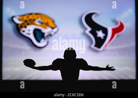 Jacksonville Jaguars contre Houston Texans. Match NFL. Match de la Ligue américaine de football. Silhouette de joueur professionnel pour une touche de touche. Écran dans b Banque D'Images