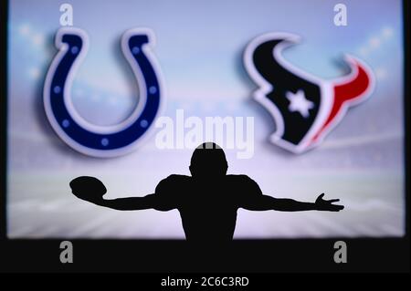 Indianapolis Colts contre Houston Texans. Match NFL. Match de la Ligue américaine de football. Silhouette de joueur professionnel pour une touche de touche. Écran en bac Banque D'Images