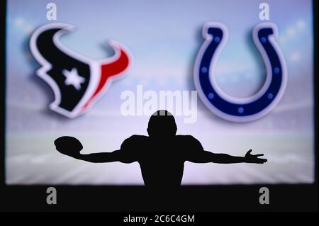 Houston Texans contre Indianapolis Colts. Match NFL. Match de la Ligue américaine de football. Silhouette de joueur professionnel pour une touche de touche. Écran en bac Banque D'Images