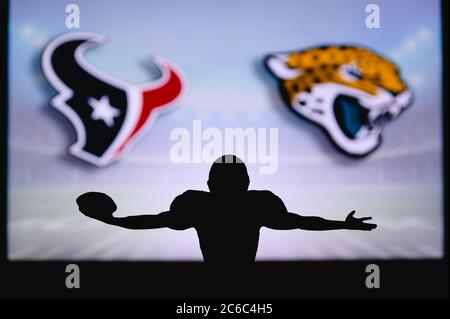 Houston Texans contre Jacksonville Jaguars. Match NFL. Match de la Ligue américaine de football. Silhouette de joueur professionnel pour une touche de touche. Écran dans b Banque D'Images