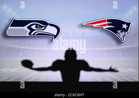 Seattle Seahawks contre New England Patriots. Match NFL. Match de la Ligue américaine de football. Silhouette de joueur professionnel pour une touche de touche. Entrée de l'écran Banque D'Images