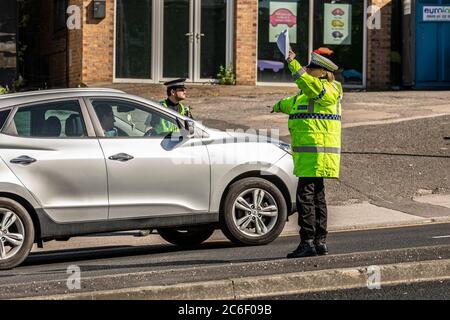 La police du coronavirus s'arrête Banque D'Images