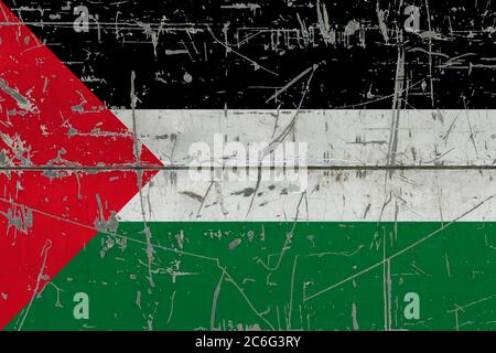 Drapeau palestinien peint sur une surface sale fissurée. Motif national sur une surface de style vintage. Concept rayé et abîmé. Banque D'Images