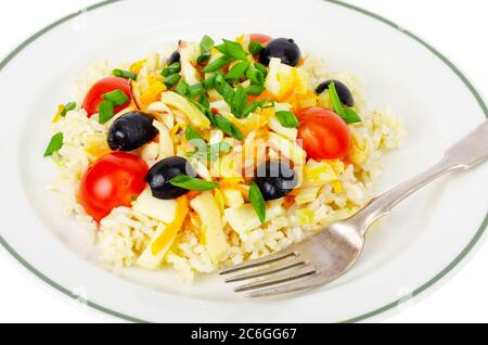 Plats de fruits de mer. Riz brun avec calmar et légumes Banque D'Images