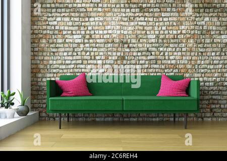 Chambre Art intérieure simple avec canapé vert, oreillers rouges et plantes décoratives près de l'ancien mur en briques, décoration artistique. Banque D'Images