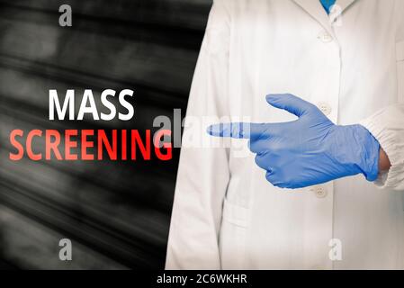 Texte écrit de mot tramage de masse. Photo d'entreprise présentant l'évaluation de santé effectuée à une grande quantité de population Afficher le papier autocollant vide Banque D'Images