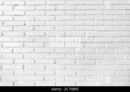 Murs de briques blanches qui ne sont pas plâtrés et texture. La texture de la brique est blanche. Arrière-plan de mur de sous-sol en brique vide. Banque D'Images