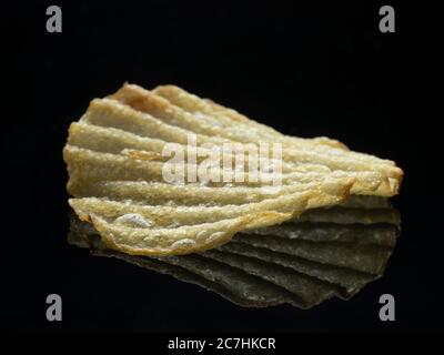 Frites bouclés, exemple de nourriture à haute vitesse et de nourriture à haute vitesse Banque D'Images