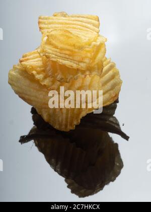 Frites bouclés, exemple de nourriture à haute vitesse et de nourriture à haute vitesse Banque D'Images