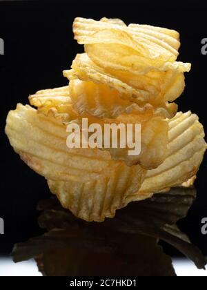 Frites bouclés, exemple de nourriture à haute vitesse et de nourriture à haute vitesse Banque D'Images