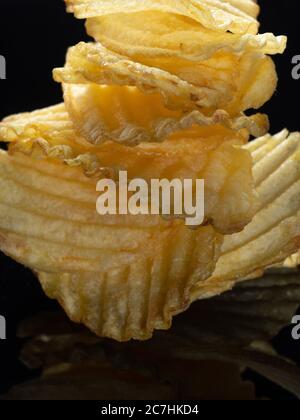 Frites bouclés, exemple de nourriture à haute vitesse et de nourriture à haute vitesse Banque D'Images