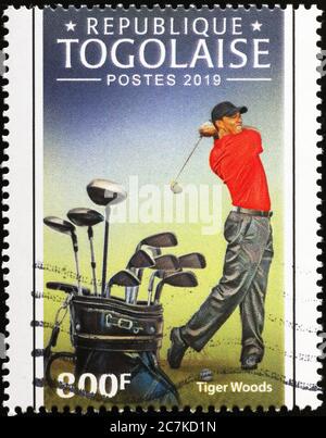 Tiger Woods en action sur timbre-poste du Togo Banque D'Images