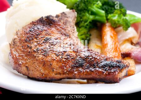 côtelette de porc avec purée de pommes de terre Banque D'Images