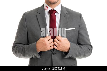 Jeune homme d'affaires avec imprimé lèvres sur col chemise sur fond blanc Banque D'Images