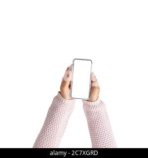 Les filles ont les mains avec un smartphone avec vue de dessus sur fond blanc. Isolé. Banque D'Images