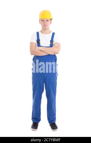 jeune homme beau en uniforme bleu de constructeur isolé sur fond blanc Banque D'Images