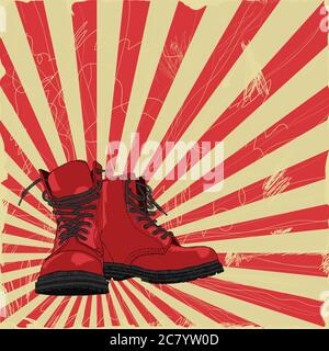 Paire de bottes à la main sur fond grunge. Banque D'Images