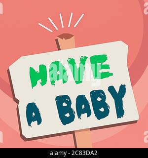 Écriture manuscrite écriture de texte ont UN bébé. Les parents de photo conceptuelle attendent ou vont avoir un nouveau-né enfant Vierge ancien signe météo géométrique Banque D'Images