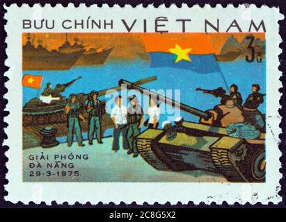 VIETNAM - VERS 1976 : un timbre imprimé au nord du Vietnam à partir du numéro de la libération du sud du Vietnam montre la libération de Da Nang, vers 1976. Banque D'Images