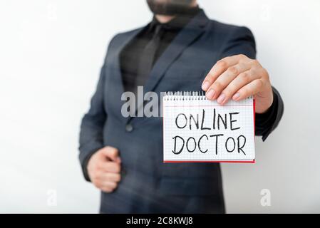 Affiche textuelle indiquant Online Doctor. Business photo texte professionnels de la santé qui fournissent des soins de santé sur l'Internet modèle affichant différents co vide Banque D'Images